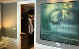 More than 90 percent of the art, like this painting in the 1,000 square foot Explorers Suite, was hand-picked by Norwegian Cruise Line Holdings chairman Frank Del Rio.